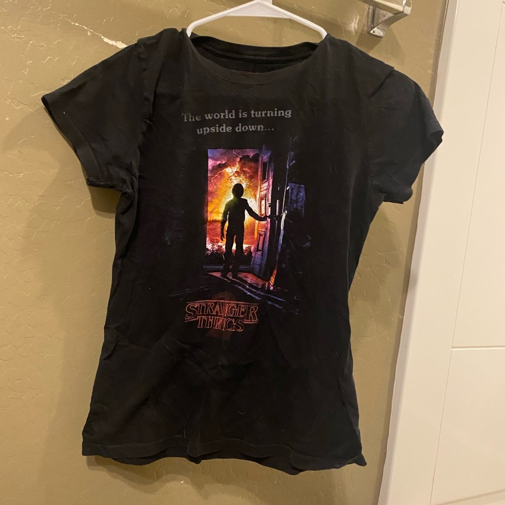 Stranger things hot topic t-shirt. Tight fitting.